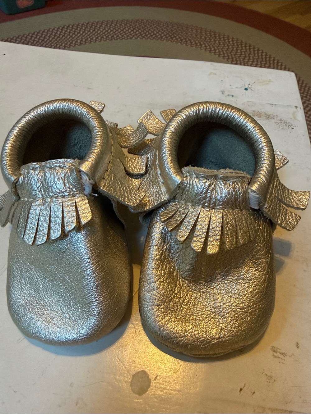 Freshly Picked Metallic Silver Fringe Baby Moccasins